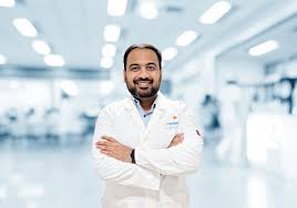 Dr Manish R
